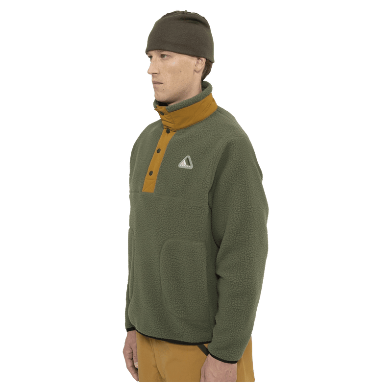 Side view of the Armada Kenlem Fleece Popover in Olive colourway, unisex's model