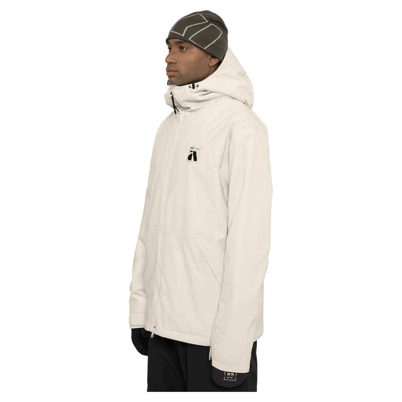 Side view of the Armada Reedy 2L Jacket in Cream colourway, men's model
