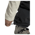 Gaiters view of the Armada Team Issue 2L Cargo Pant in Black colourway, men's model