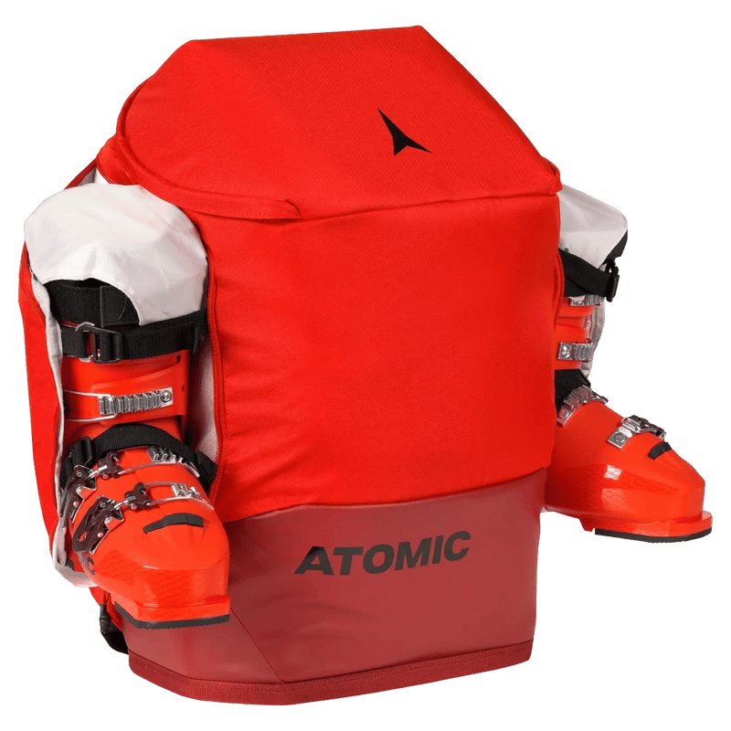 Ski boots mounted view of the Atomic Rs Pack 30L Boot Bag in Red colourway, unisex model