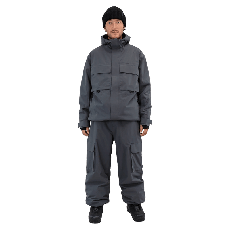 Beyond Medals Cargo 2L Snowboard Pants in dark grey with large side pockets and a baggy fit.