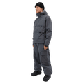 Beyond Medals Cargo 2L Snowboard Pants in slate grey with large cargo pockets, worn with a matching technical jacket.