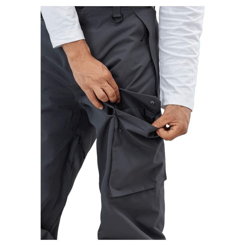 Dark grey Beyond Medals Cargo 2L Snowboard Pants with a large side cargo pocket and snap button closure.