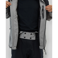 Powder skirt view of the Beyond Medals Fullzip 2L snowboard Jacket in Grey colourway, unisex's model