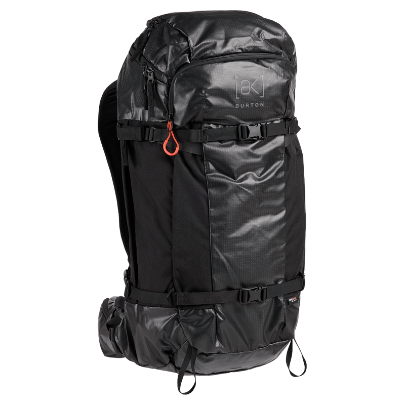 Black Burton AK Dispatcher backpack with glossy panels, compression straps, and a red zipper pull.