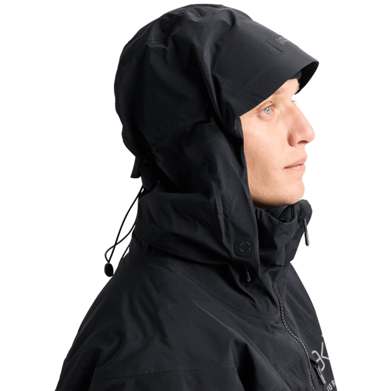 Side profile of a black Burton AK Lz Gore-Tex jacket with an adjustable hood, brim, and high collar.