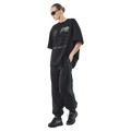 Full side view of P.E Nation Current Oversized Tee - Womens in colour Black.