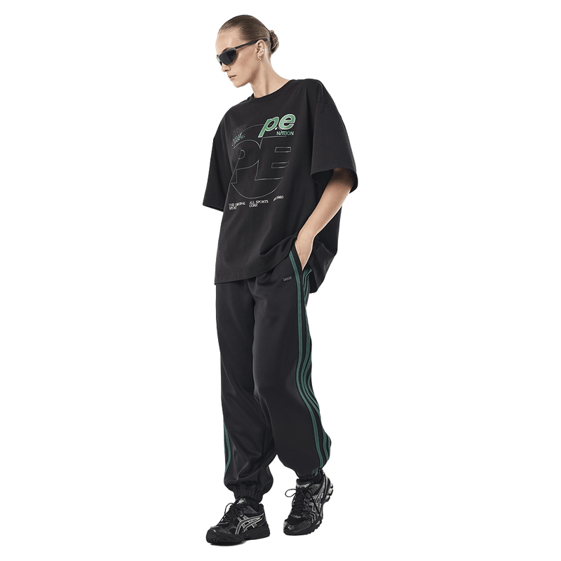 Full side view of P.E Nation Current Oversized Tee - Womens in colour Black.