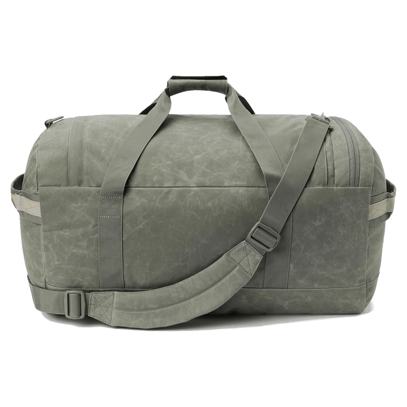 Back view of the Dakine EQ Duffle 50L Travel Bag in Mulled Brasil colourway, unisex's model
