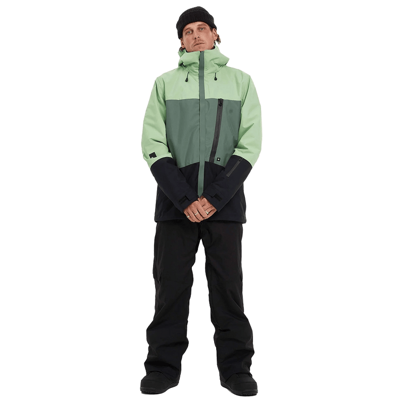 Front view of man wearing Elude Terra Firma Ski Jacket in Green
