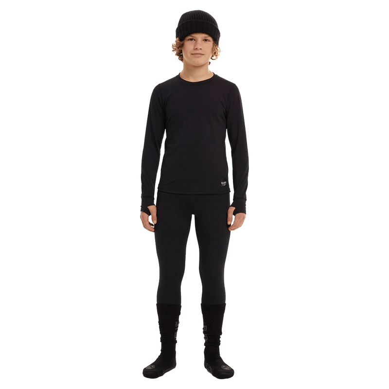 Worn view of the Elude Boys 7-8 Thermal Top in TRUE BLACK colourway, kids model