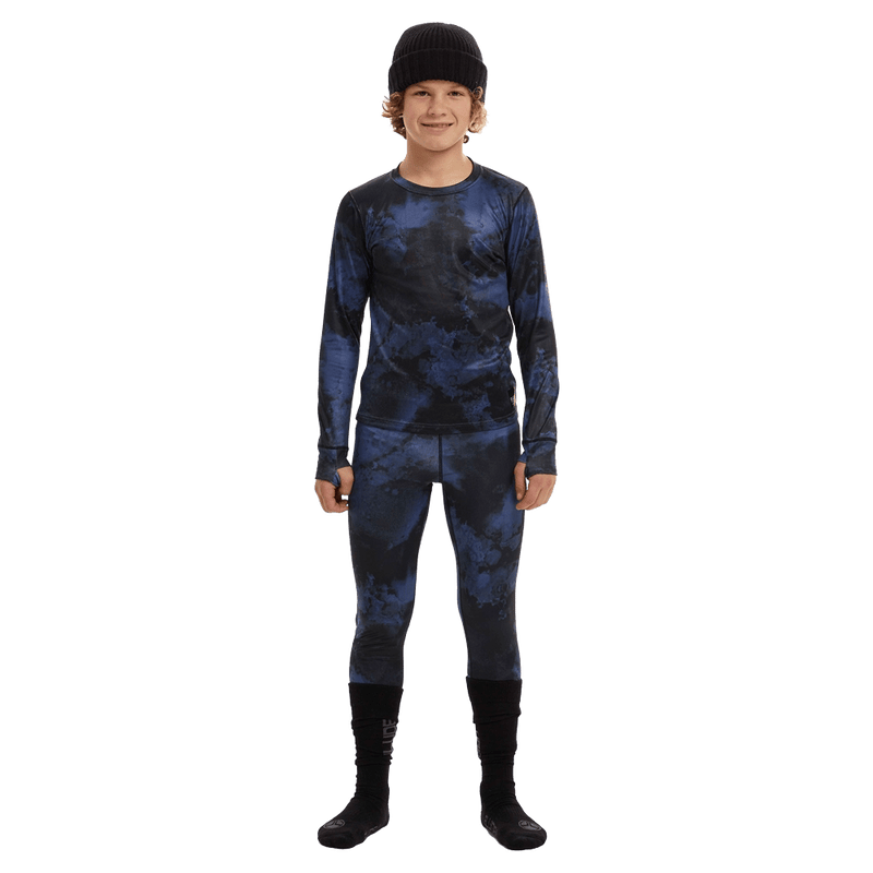 Worn view of the Elude Boys 7-8 Thermal Top in VINTAGE INK colourway, kids model