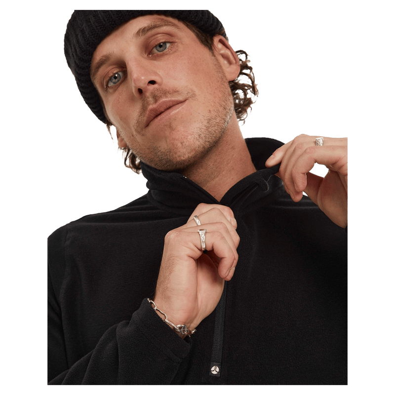 Close view of the Elude Mifrofleece Quarter Zip Jamper in True Black colourway, men model