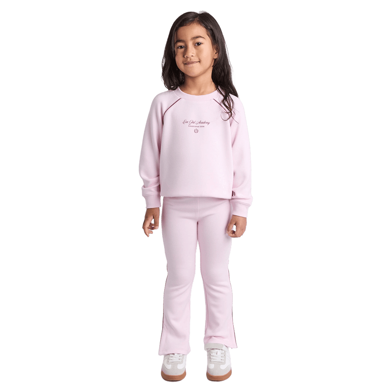 Full-body view of the Eve Girl Aspen Flare in Pale Pink colourway, toddler's model