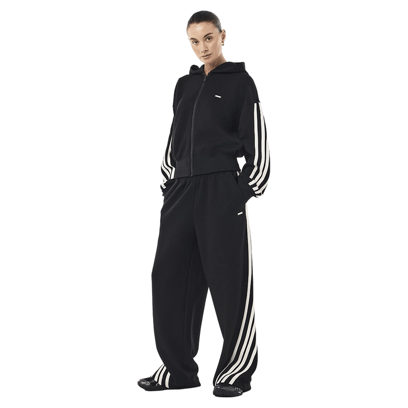 Side view of P.E Nation Flip Side Zip Thru Hoodie in colour Black