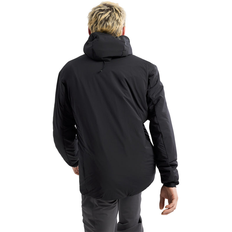 Man wearing the Arcteryx Proton Hoodie in Black