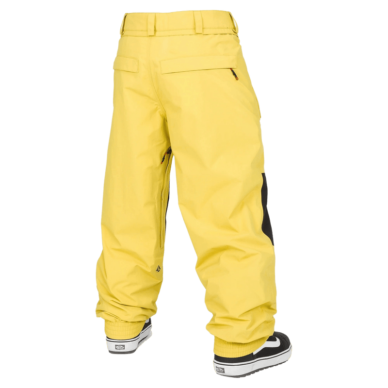 Rear view of yellow Volcom Longo Gore-Tex snowboard pants with back pockets, belt loops, and elasticated ankle cuffs.