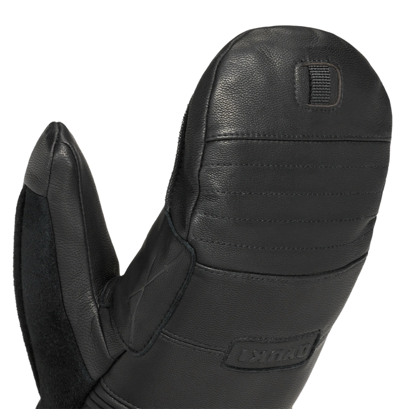 Detail view of the upper Arashi Guide Gtx Mitts in Black featuring a reverse leather nose wipe.