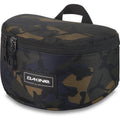 Dakine Goggle Stash case in dark camouflage with a zippered top, carrying handle, and front logo patch.