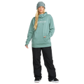 Front, on body image of the Riding Hydro Pullover - Womens in Arctic Blue. Features a hood with adjustable drawstrings, high collar neckline, a kangaroo pocket, long sleeves with thumb hole opening, and contrast white branded print across chest.