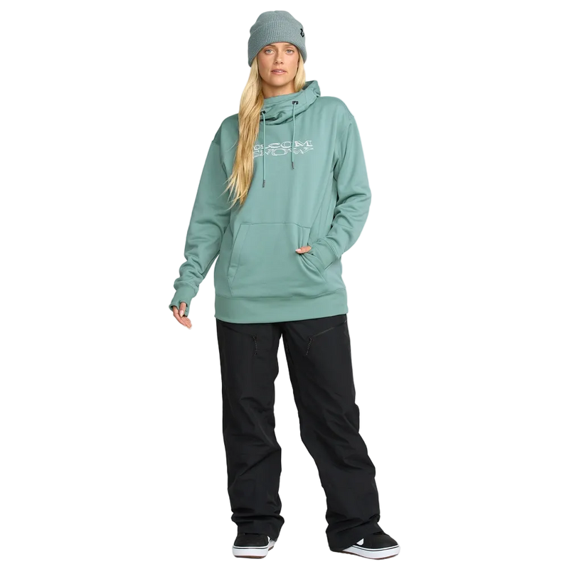 Front, on body image of the Riding Hydro Pullover - Womens in Arctic Blue. Features a hood with adjustable drawstrings, high collar neckline, a kangaroo pocket, long sleeves with thumb hole opening, and contrast white branded print across chest.