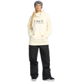 Front, on body image of the Riding Hydro Pullover - Womens in Bone. Features a hood with adjustable drawstrings, high collar neckline, a kangaroo pocket, long sleeves with thumb hole opening, and contrast black branded print across chest.