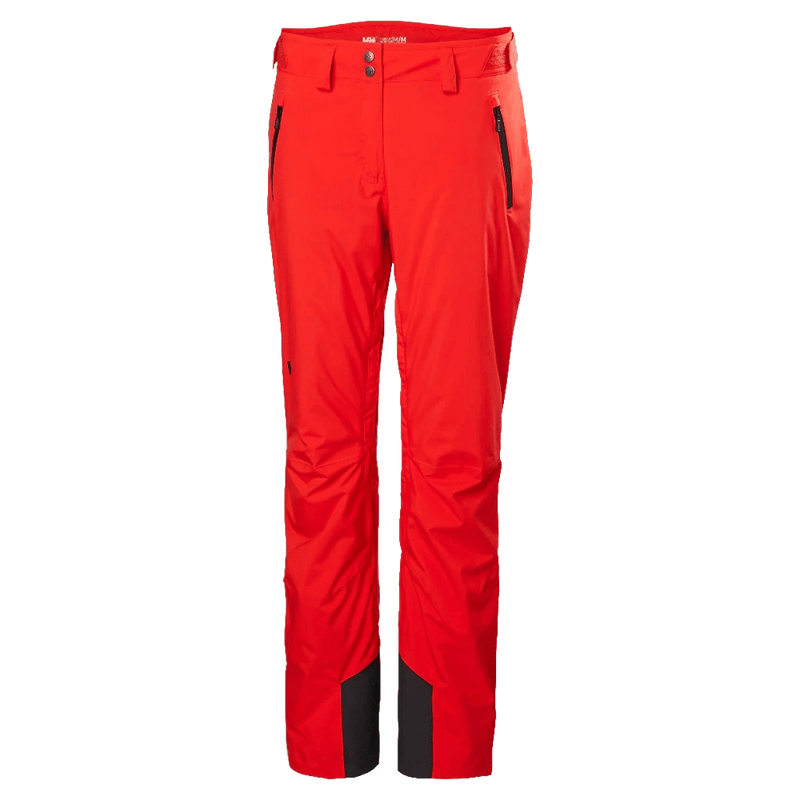 Helly Hansen women's Legendary insulated ski pants in red with front zip pockets and reinforced inner ankle patches.
