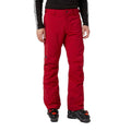 Red Helly Hansen Legendary Insulated Ski Pants worn with black ski boots, front view.