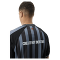 Back view of Afends Holloway Recycled Raglan Jersey in colour Black.