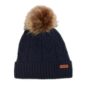 View of the Isla Beanie in Navy. Featuriing a cable knit design with ribbed fold up hem, leather brand tag and brown fur pom pom. 