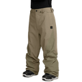 Tan Volcom Kleveland baggy snowboard pants with reinforced inner leg panels and a small black logo patch on the thigh.