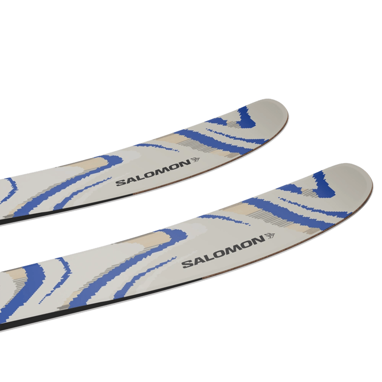 Tip view of the SALOMON QST 106 Almond Milk Skis,  26/27 Unisex's model