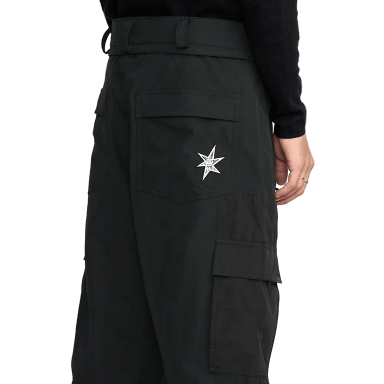Black Volcom Longo Gore-Tex snowboard pants with a white star logo on the back pocket and a side cargo pocket.