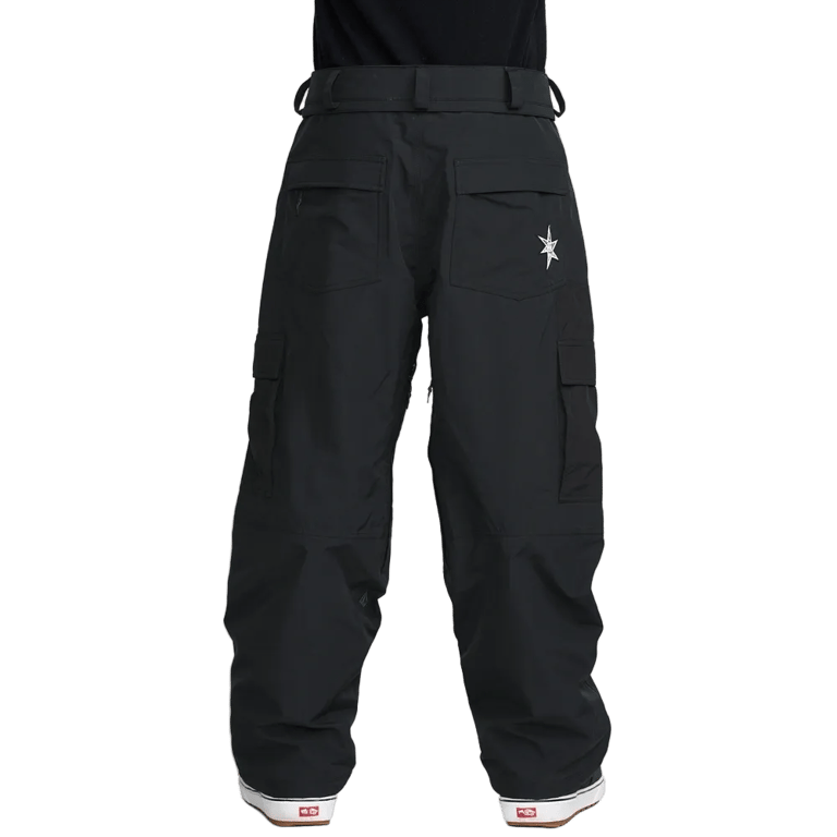 Rear view of black Volcom Longo Gore-Tex snowboard pants with cargo pockets and a white star logo on the back pocket.