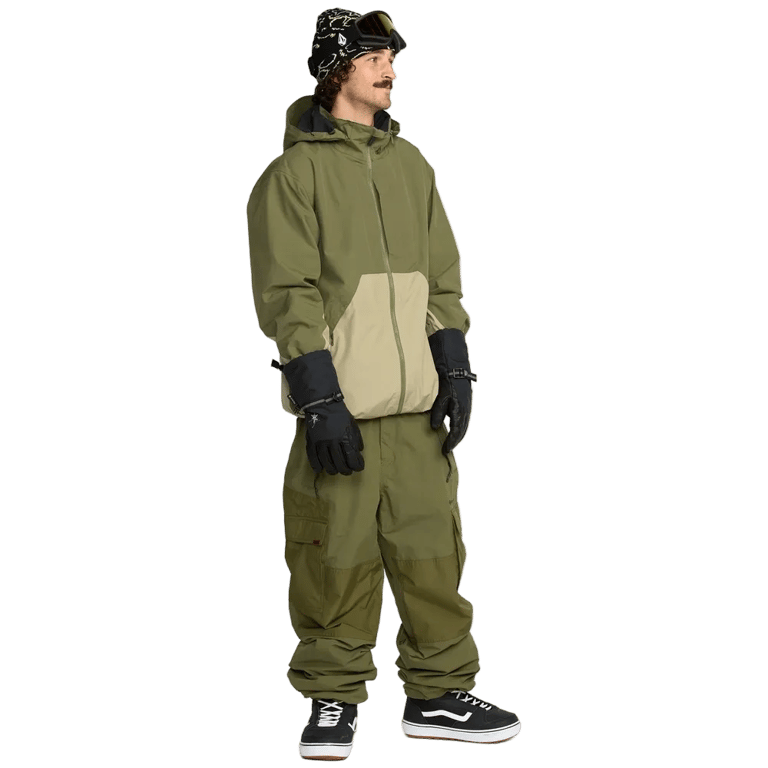 Olive green Volcom Longo Gore-Tex Snowboard Pants with a baggy fit and cargo pockets worn with a matching jacket.