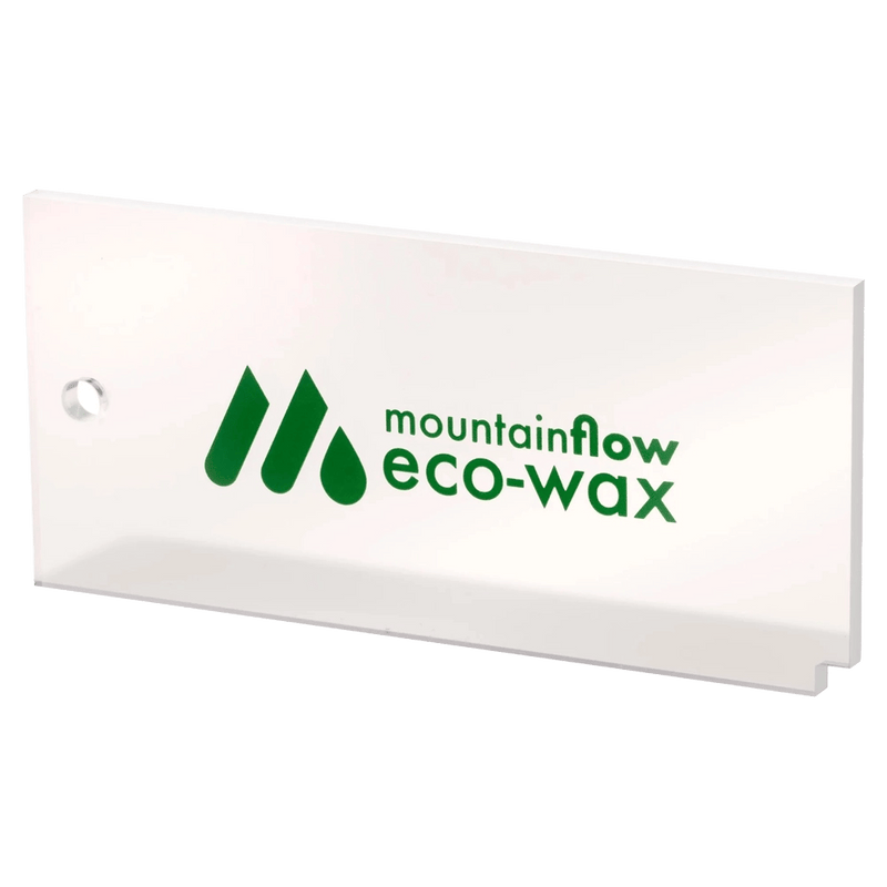 Image of a white plexi wax scraper with green branding