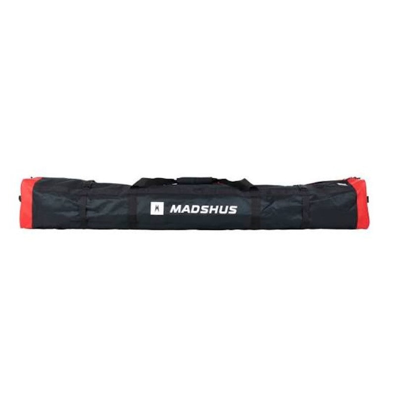 Madshus 15 pair cross country ski bag in polyester nylon thick material, main body in black with ends in red. black carry strap and white writing.