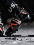 Model foot on ski showing the Madshus Redline Skate X cross country boot attached to the binding