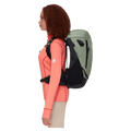Carried side view of the Mammut Ducan 24 Backpack in Jade Black colourway, women model