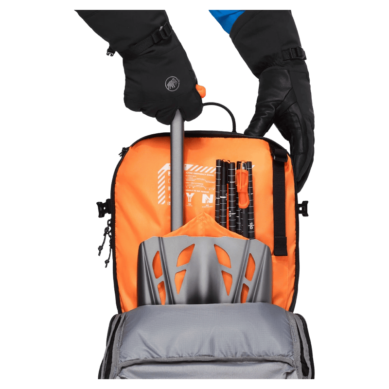 Avalanche pocket view of the Mammut Nirvana 22L Backpack in black colourway, unisex model