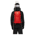 Carried view of the Mammut Nirvana 22L Backpack in mammut red-black colourway, unisex model