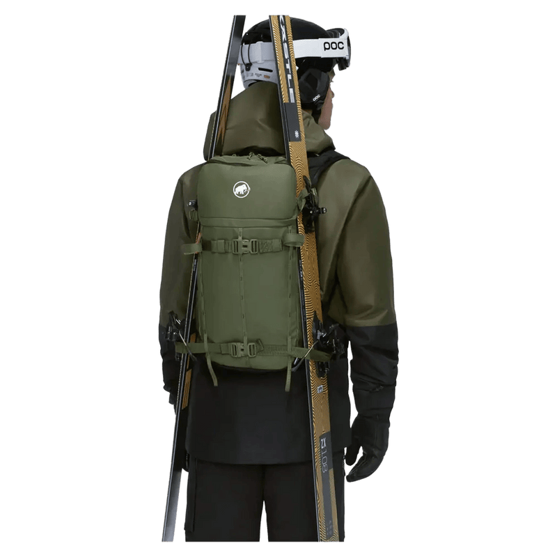 Carried view of the Mammut Nirvana 22L Backpack in marsh-black colourway, unisex model