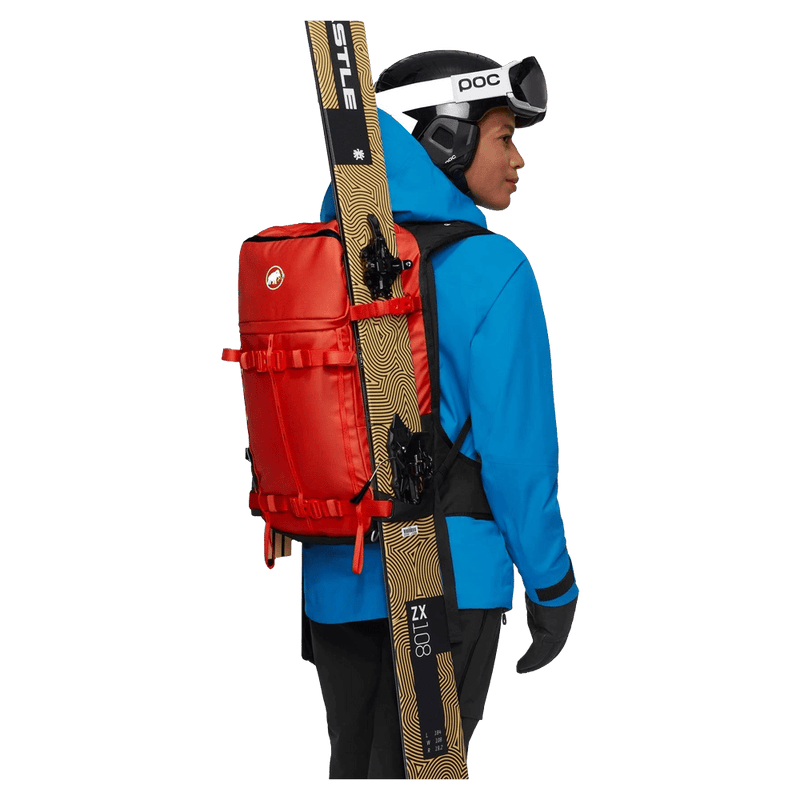 Carried view of the Mammut Nirvana 28 Backpack in mammut red-black colourway, unisex model
