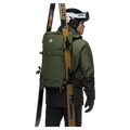 Carried view of the Mammut Nirvana 28 Backpack in marsh-black colourway, unisex model
