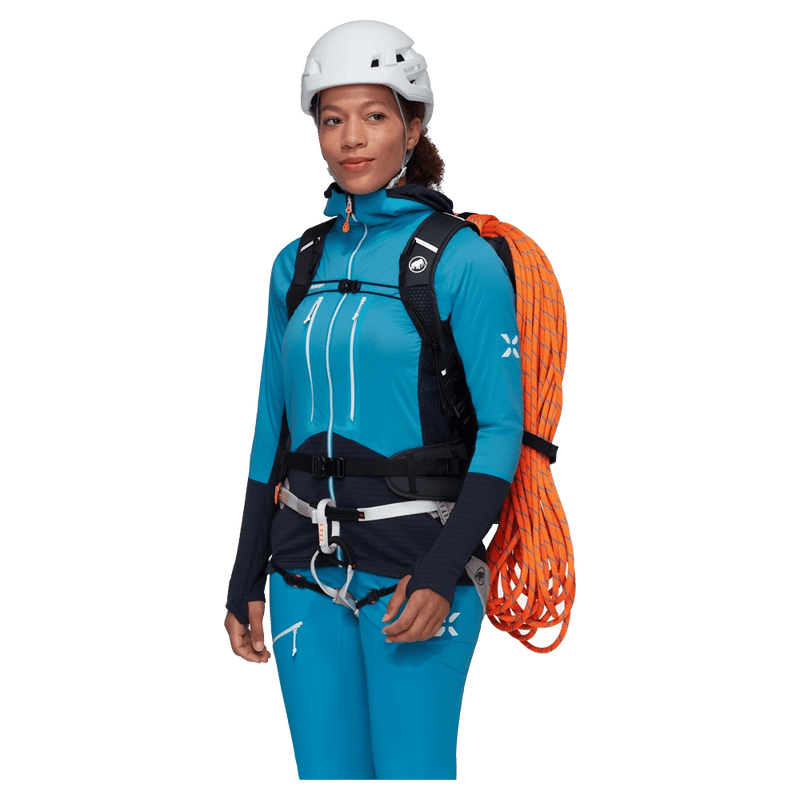 Carried view of the Mammut Trion 28 Backpack in Marine Black colourway, women model