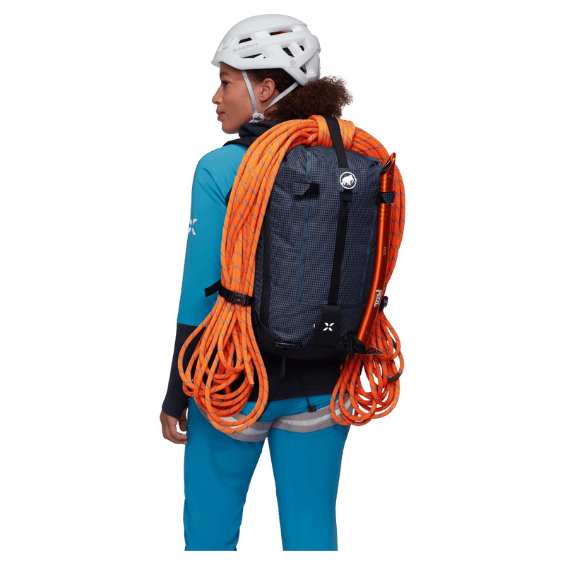 Back, carried view of the Mammut Trion 28 Backpack in Marine Black colourway, women model