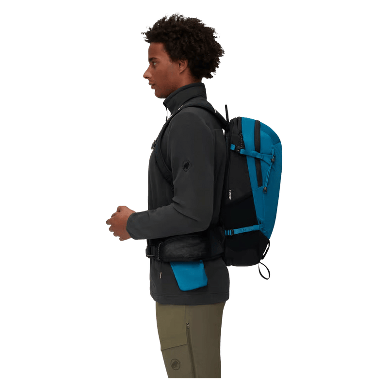 Side view of the Mamut Lithium 15 Backpack in Sapphire Black colourway, unisex's model