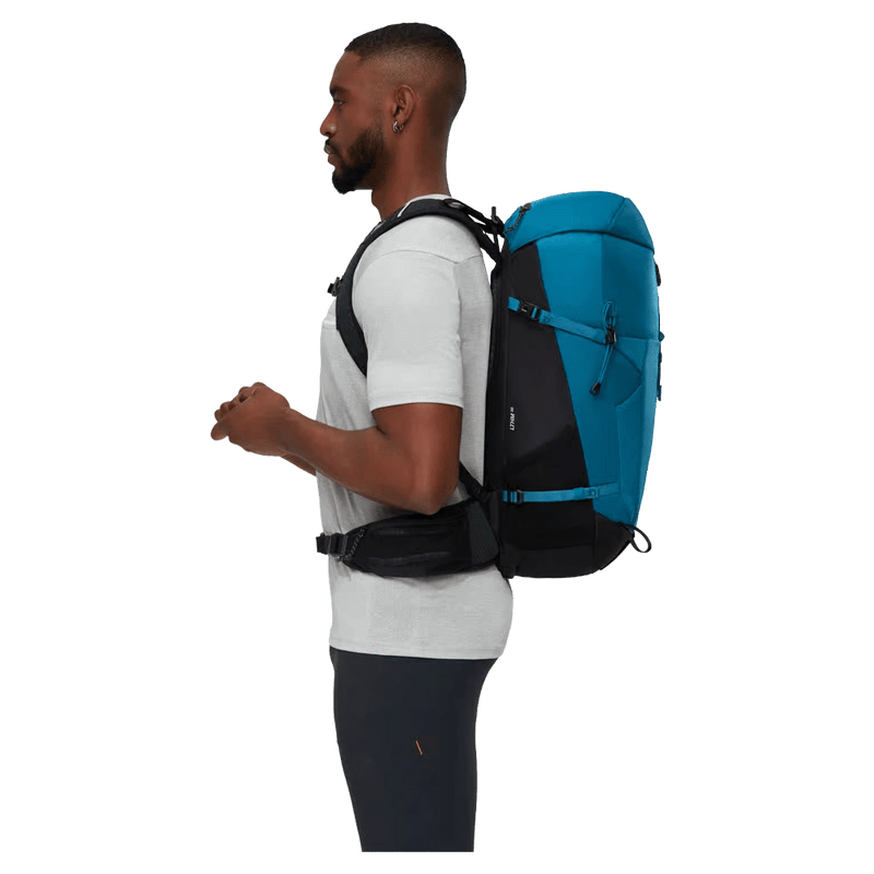 Side view of the Mamut Lithium 30L Backpack in Sapphire Black colourway, unisex's model