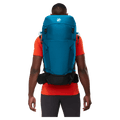 Carried view of the Mamut Lithium 40L Backpack in Sapphire Black colourway, unisex's model