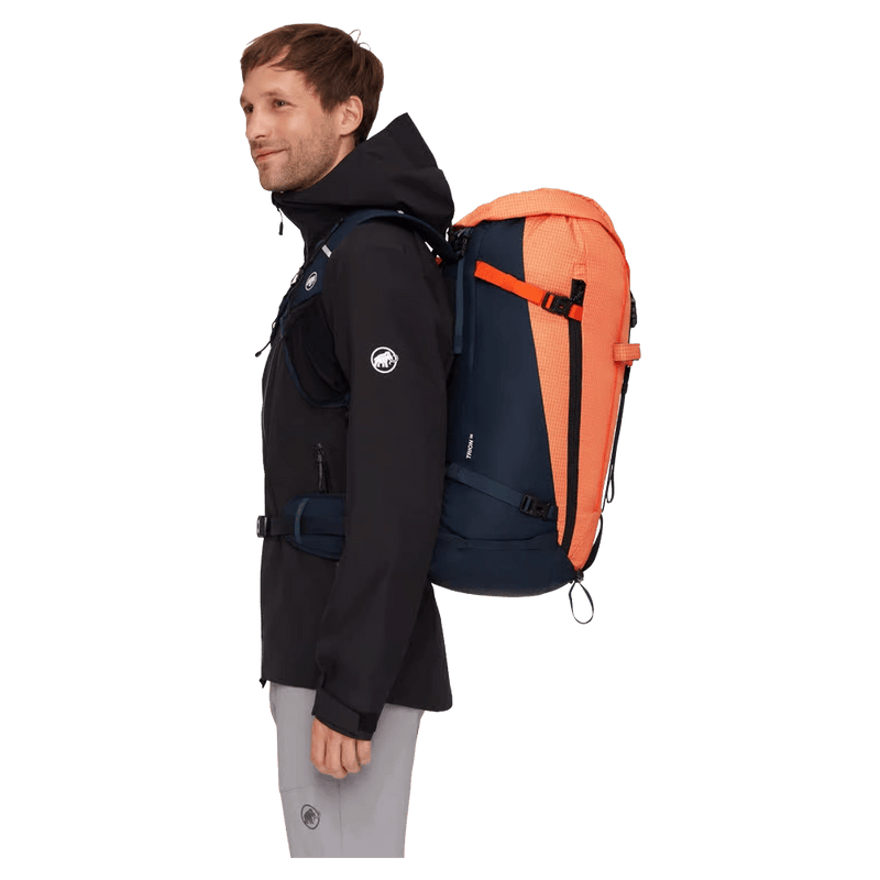 Side view of the Mamut Trion 38L Backpack in Arumita and Marine colourway, unisex's model
